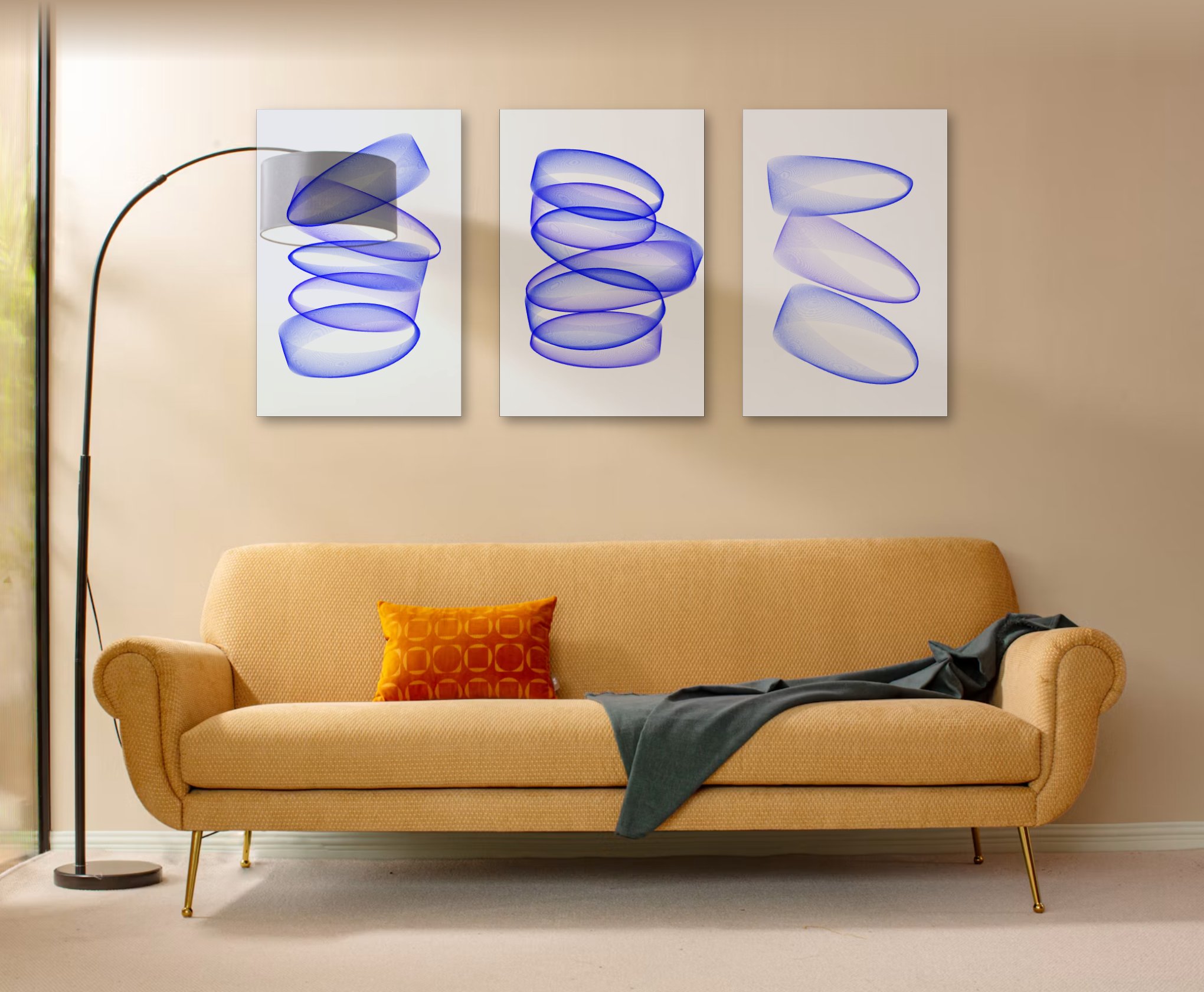 Three 16 by 24 inch posters hung as a trio above a sofa